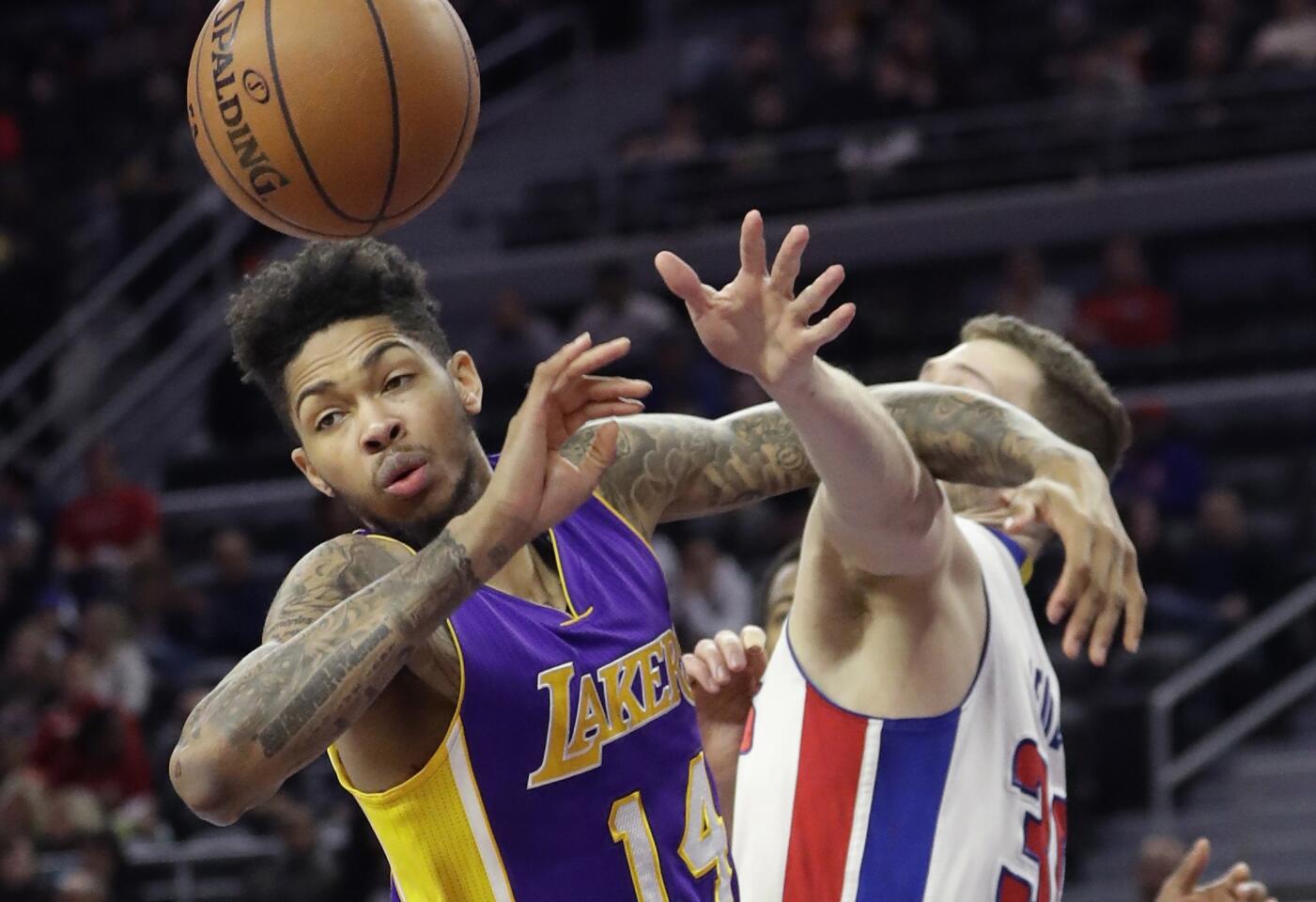 Pistons forward Jon Leuer knocks the ball away from Lakers forward Brandon Ingram during the second half.