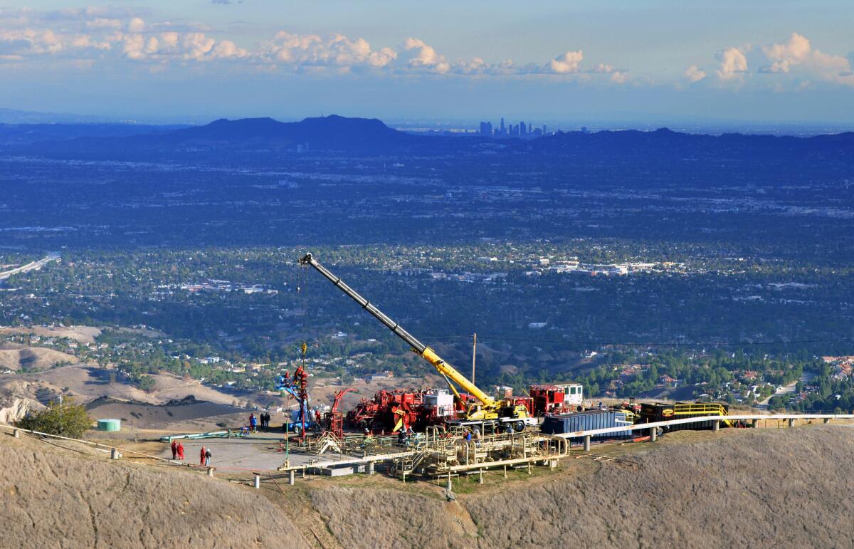 SoCalGas crews and technical experts attempt to safely stop the flow of natural gas leaking from a storage well at the utility’s Aliso Canyon facility near Northridge section of Los Angeles.