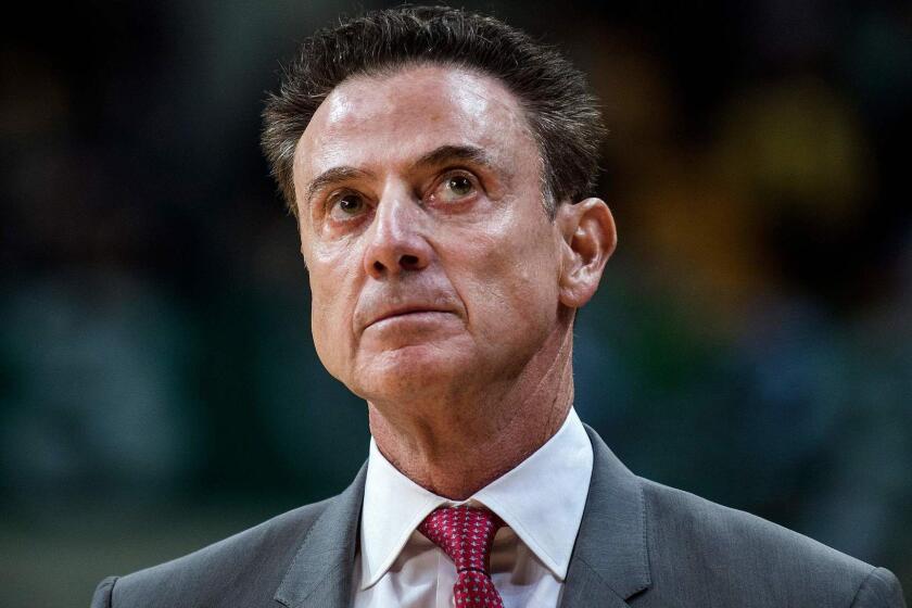 US coach of Panathinaikos Rick Pitino (C) looks on during a Euroleague basketball match between Panathinaikos and Anadolu Efes at The OAKA Stadium in Athens, on February 1, 2019. - One of the biggest coaching names in US college basketball, Pitino has not lost a game in the Greek league after being hired just after Christmas 2018. (Photo by ANGELOS TZORTZINIS / AFP)ANGELOS TZORTZINIS/AFP/Getty Images ** OUTS - ELSENT, FPG, CM - OUTS * NM, PH, VA if sourced by CT, LA or MoD **