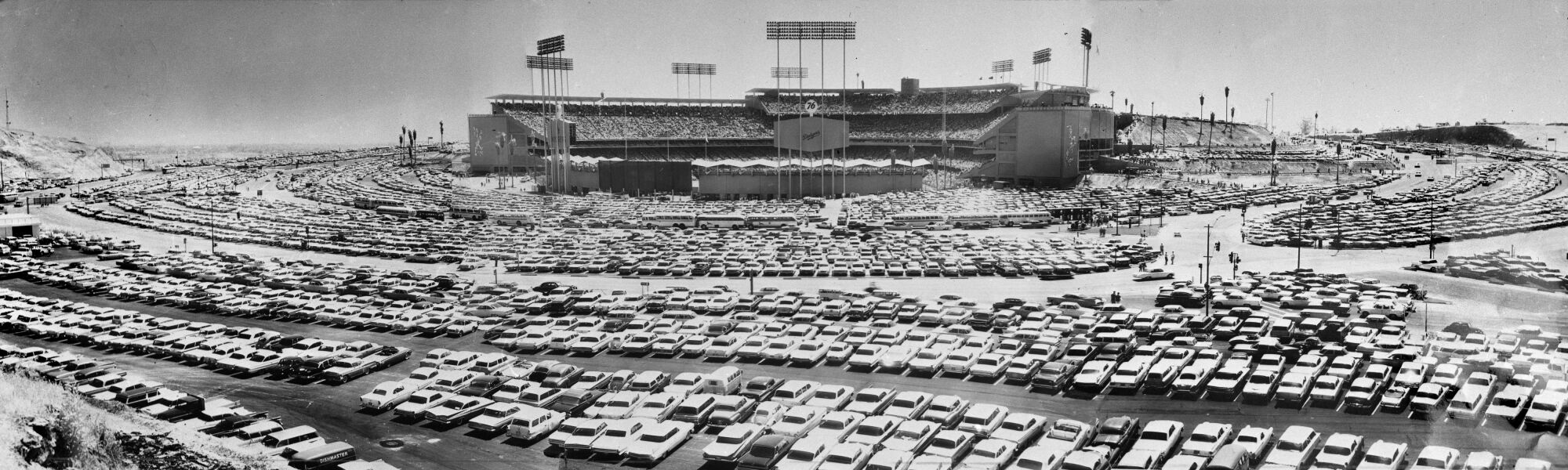 A view of the parking lot outside Dodger Stadium during the first regular-season game ever played at the stadium.
