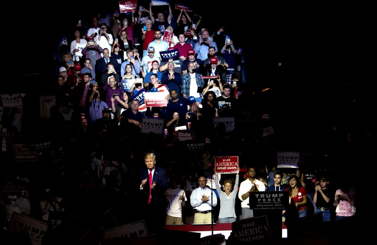 Donald Trump walks off the stage after speaking in Cincinnati, Ohio, on Oct. 13, 2016.