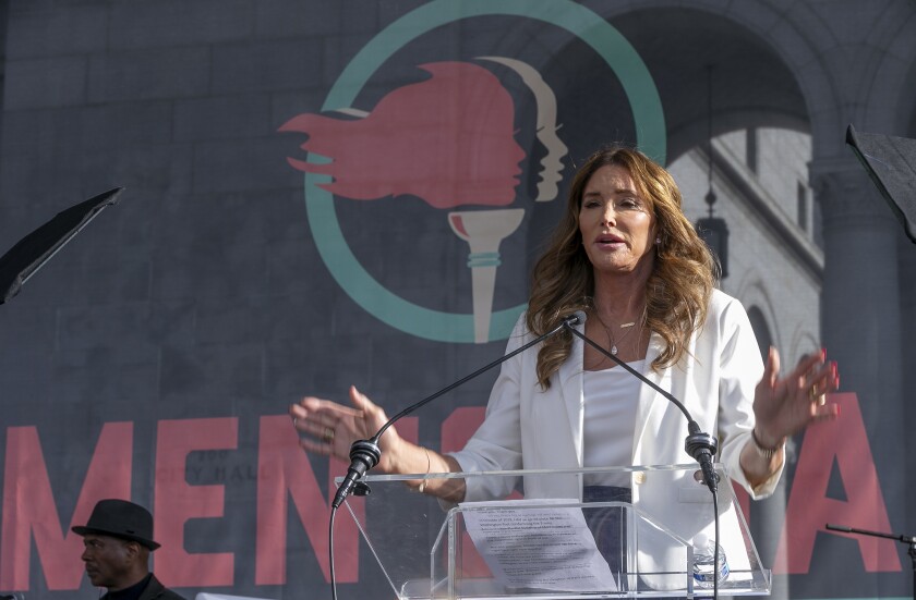 FILE - In this Jan. 18, 2020, file photo, Caitlyn Jenner speaks at the fourth Women's March in Los Angeles. Jenner, the former Olympic champion and reality TV personality now running for California governor, said she opposes transgender girls competing in girls' sports at school. Jenner told a TMZ reporter on Saturday, May 1, 2021, that it's "a question of fairness." (AP Photo/Damian Dovarganes, File)