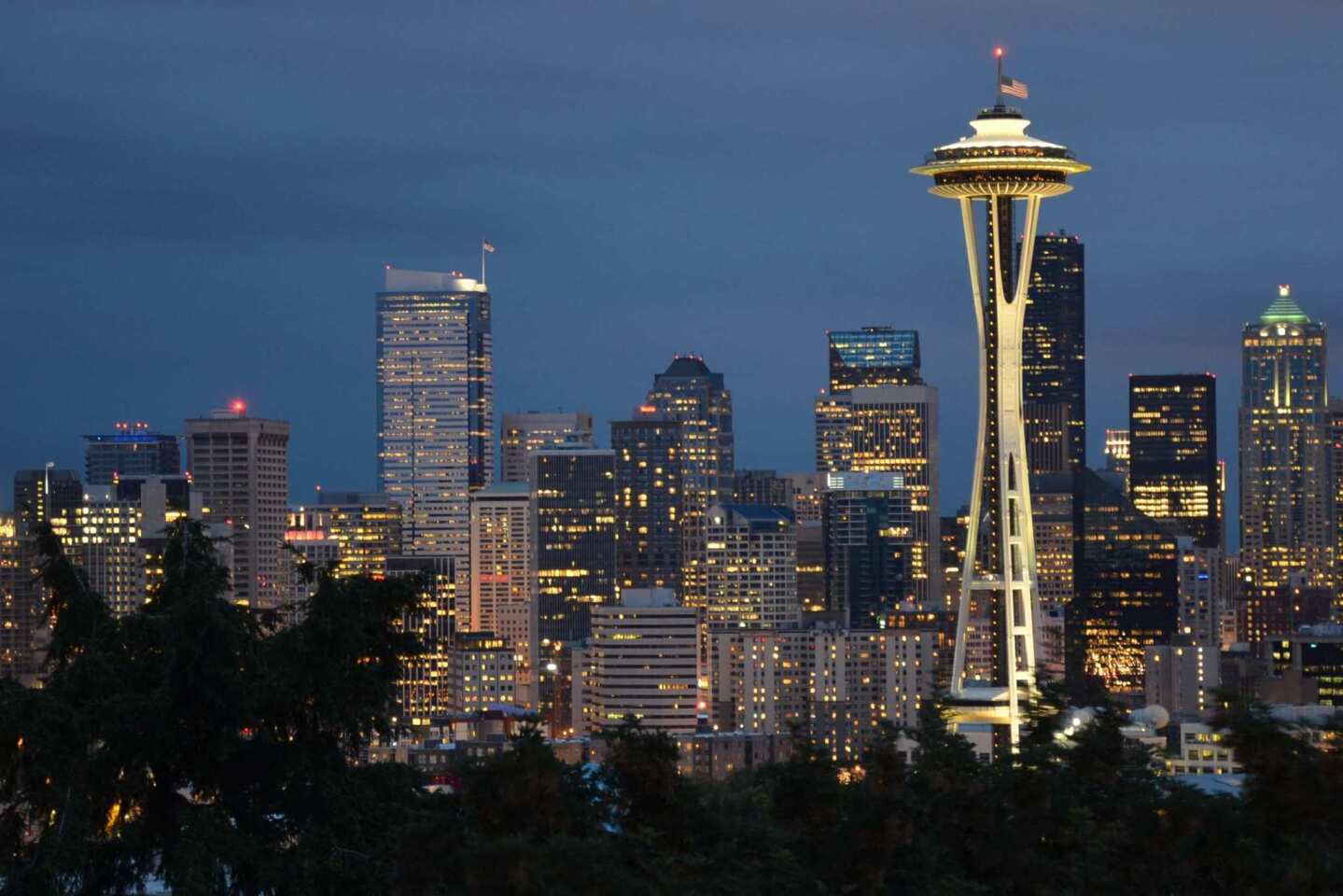 The Space Needle is the centerpiece of this skyline view of Seattle from Kerry Park on Queen Anne Hill. Summer in Seattle means going out and fully embracing the city and its many neighborhoods.