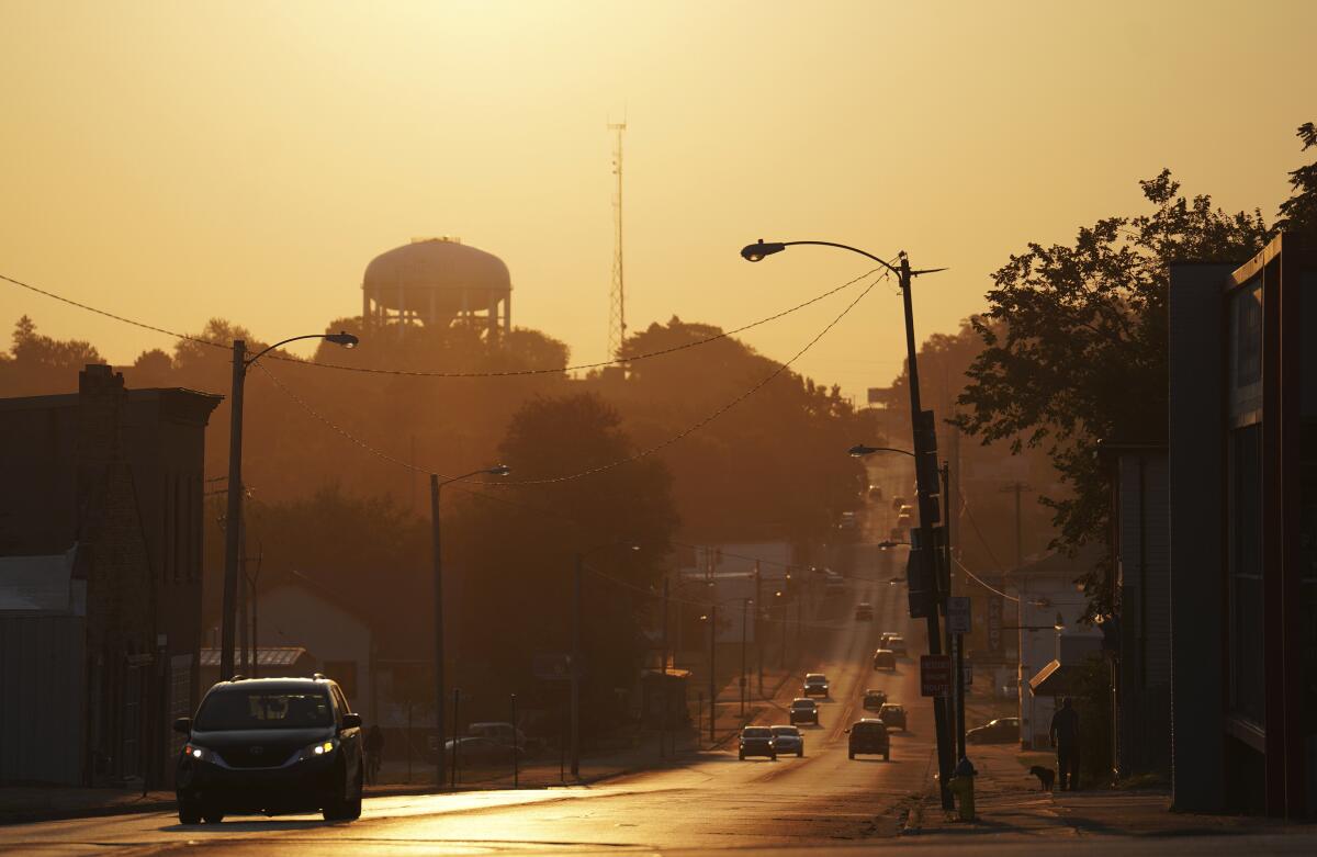 The sun rises over the city of Springfield, Ohio.