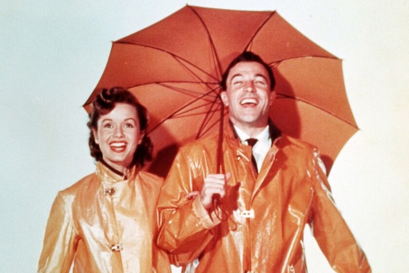 Debbie Reynolds costars with Gene Kelly in the 1952 musical "Singin' in the Rain," part of a tribute to the late actress airing on Turner Classic Movies.
