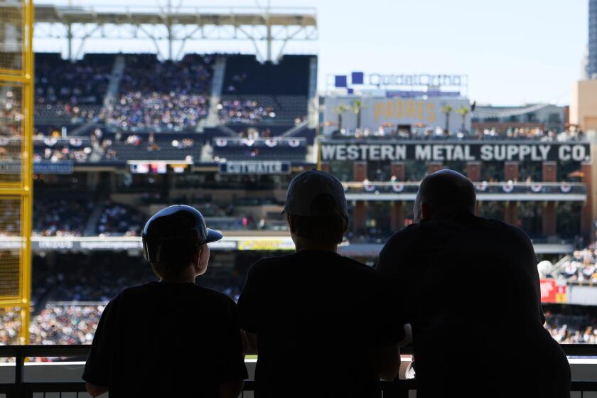 San Diego, CA - April 03: Fans watch the Padres play the St. Louis Cardinals at Petco Park on Wednesday, April 3, 2024 in San Diego, CA. (Meg McLaughlin / The San Diego Union-Tribune)
