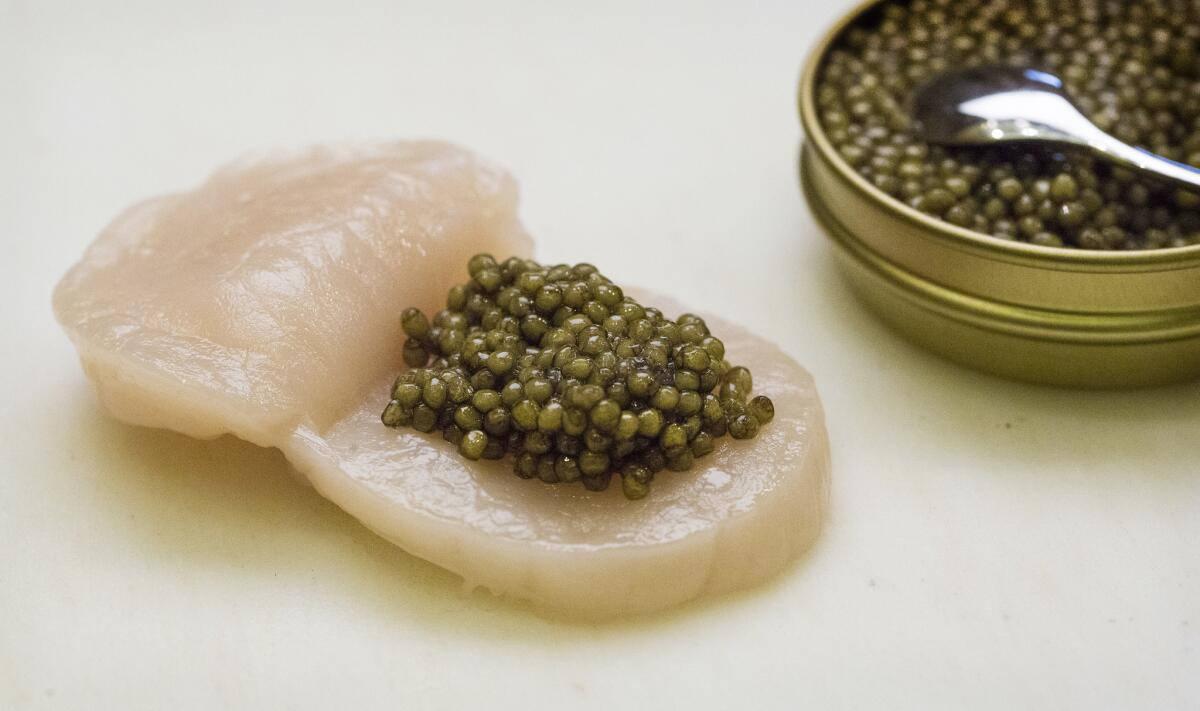 Preparing scallop tempura with caviar at Tempura Endo.