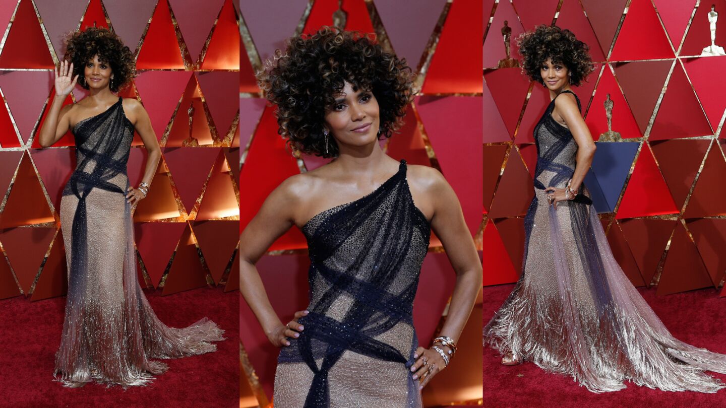 We like Halle Berry. And we like Versace. But the usually stunning Berry fell as flat as her hair stood high in this Atelier Versace ensemble.
