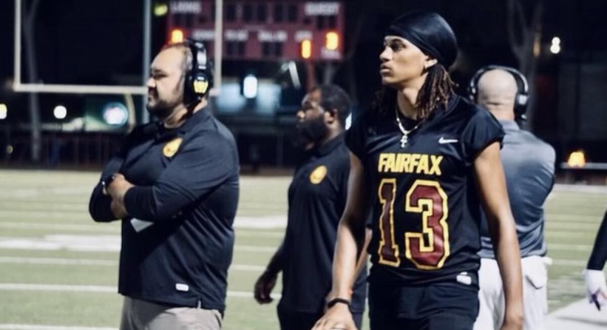 Romello McRae (right) was the Fairfax ball boy for 10 weeks because his mom wouldn't let him play.