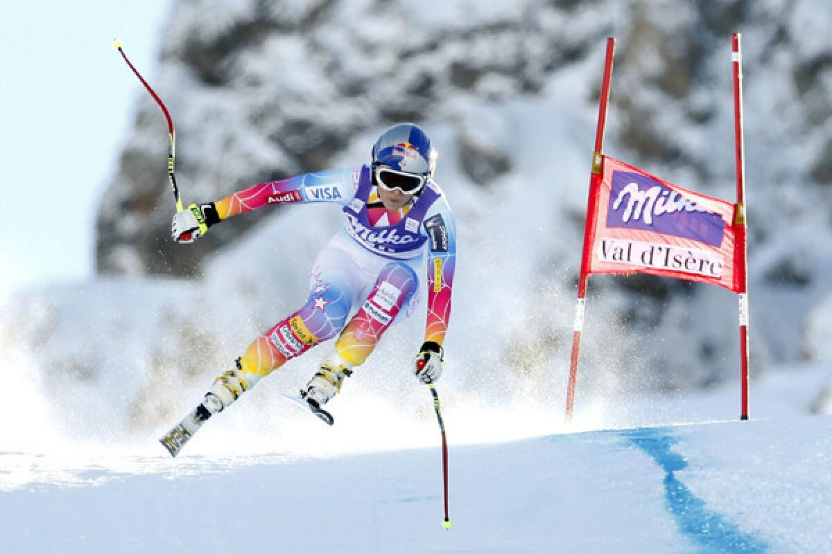 Lindsey Vonn competes in a World Cup downhill skiing event at Val D'Isere, France, on Dec. 21. Forbes says Vonn will be "the primary female face of the 2014 Winter Olympics."