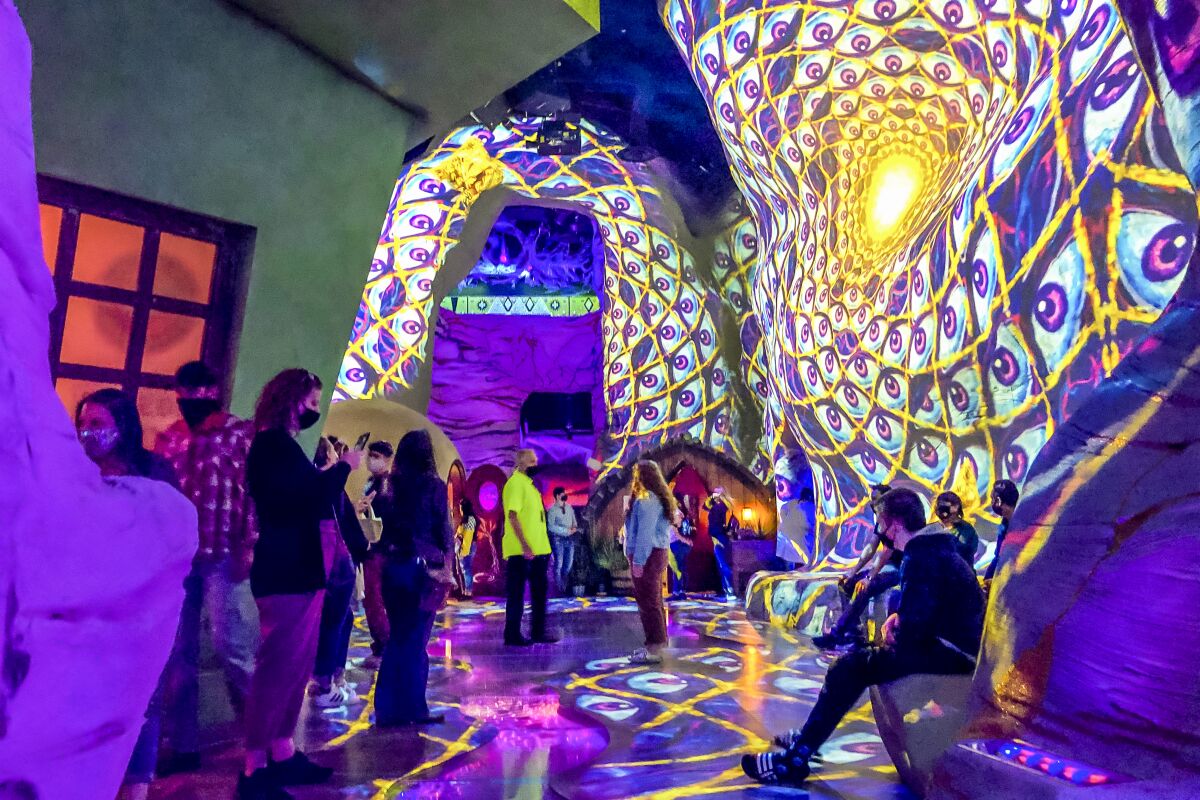 People walk inside an installation in Las Vegas