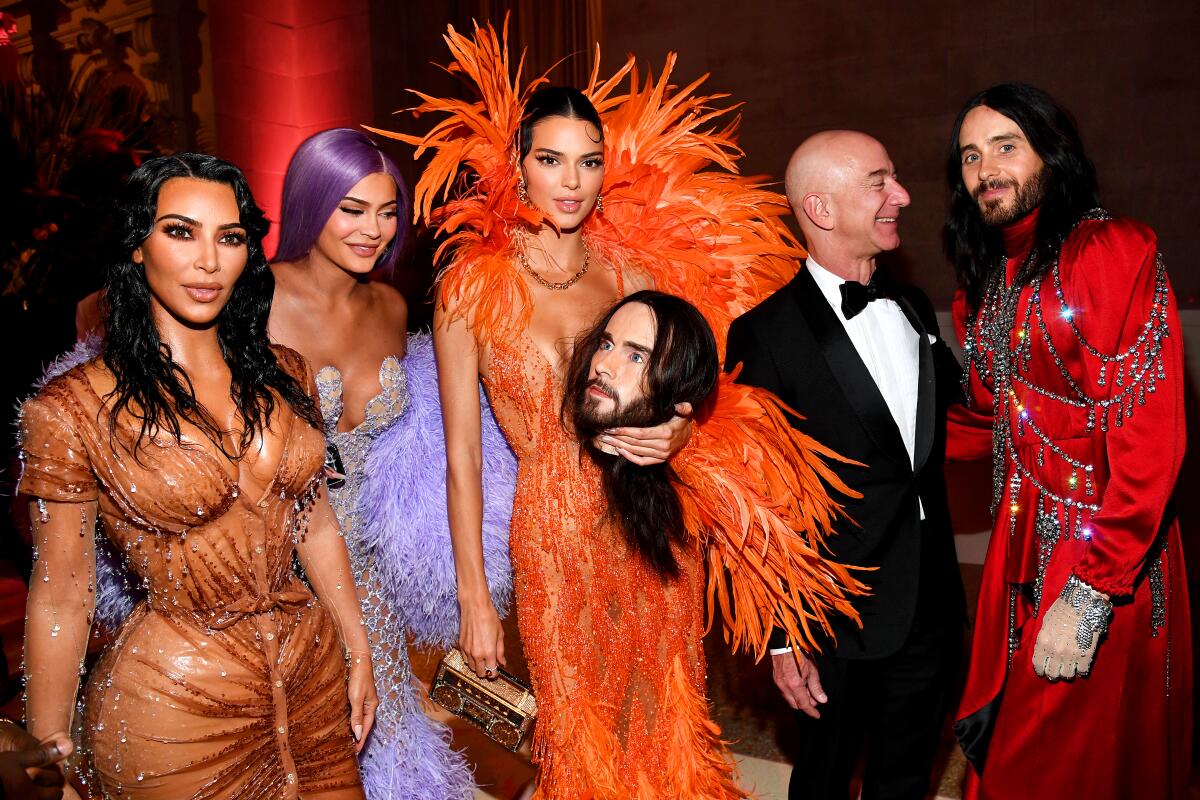 Kim Kardashian, Kylie Jenner, Kendall Jenner (holding Jared Leto's mannequin head), Jeff Bezos and Jared Leto