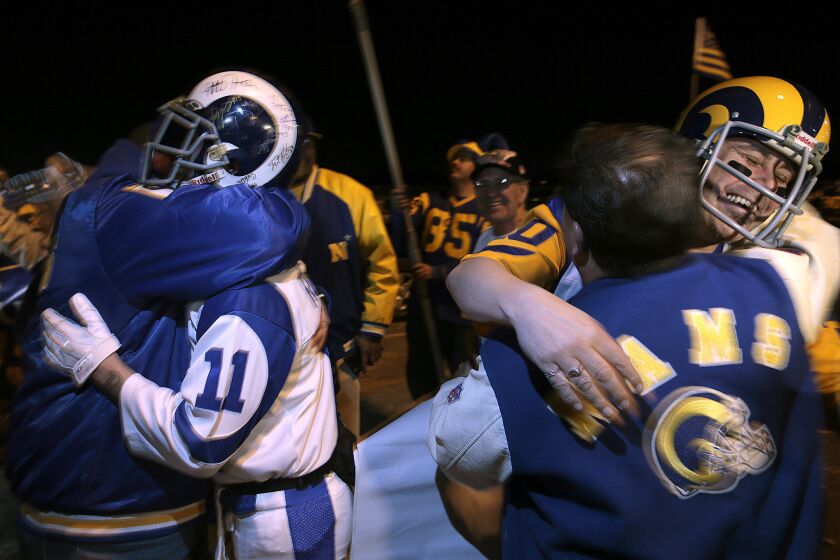 Rams fans rally at Hollywood Park on Jan. 12 to celebrate the NFL's decision to allow the Rams to relocate to Inglewood from St. Louis.