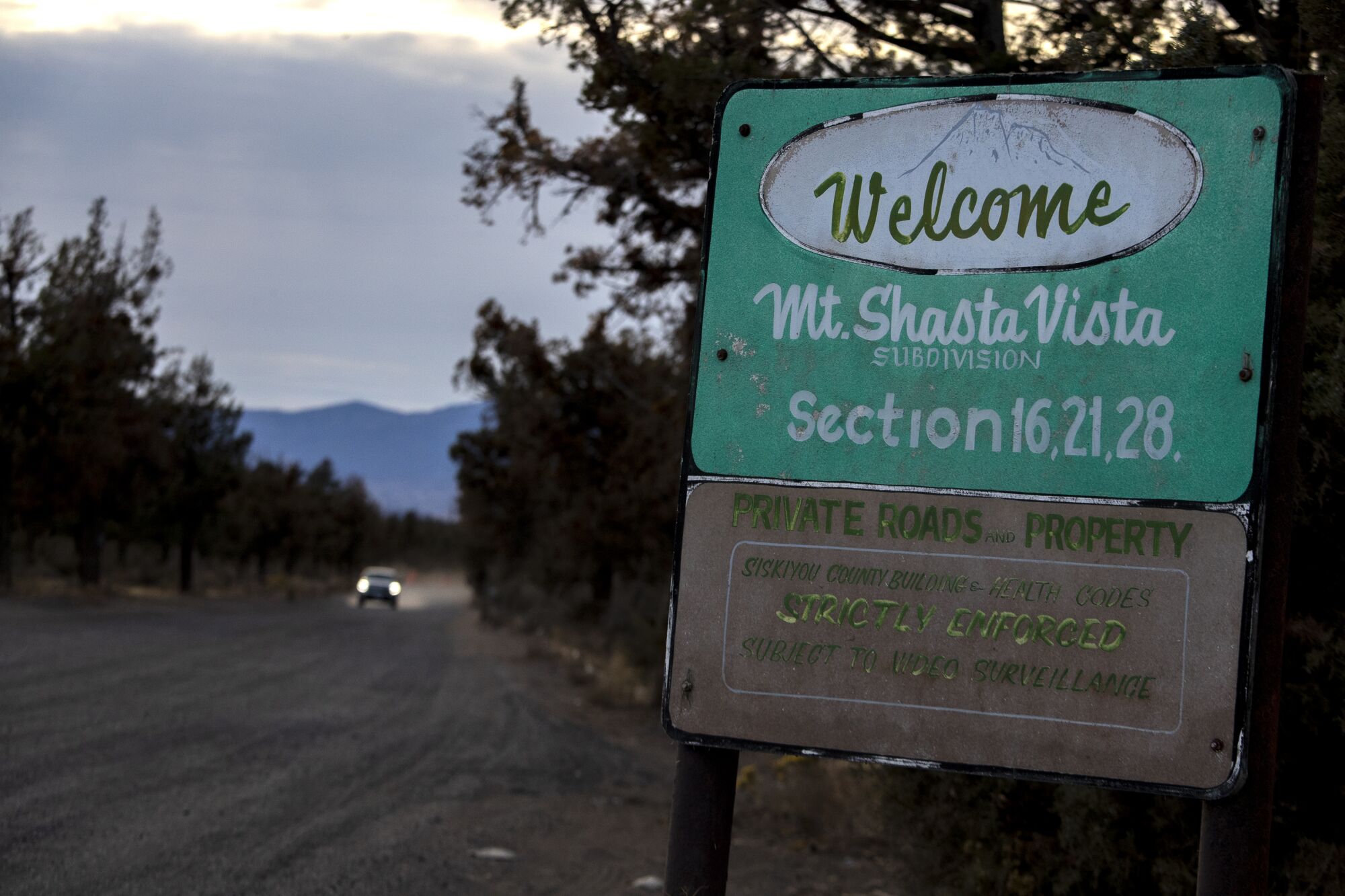 An entrance sign on a dusty road on the Mount Shasta Vista subdivision in Siskiyou County.