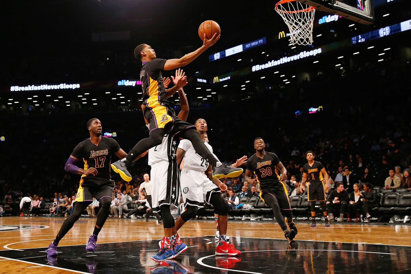 Los Angeles Lakers' Jordan Clarkson (6) attempts a basket against the Brooklyn Nets on Friday.