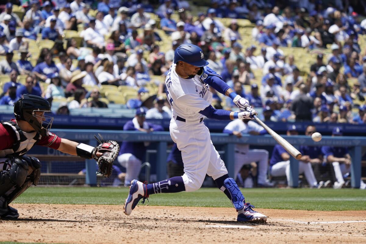 Dodgers' Mookie Betts connects for a two-run home run.