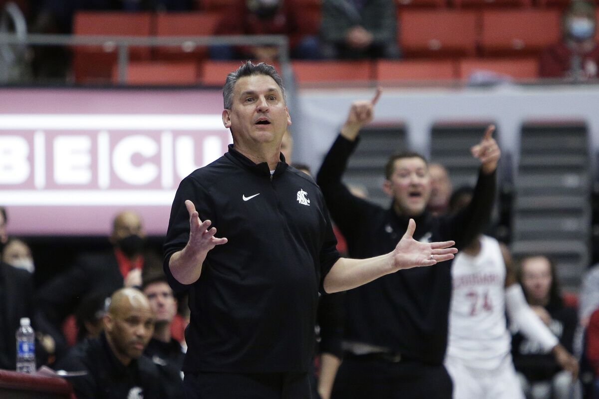 Washington State coach Kyle Smith reacts during the second half of the team's NCAA college basketball game against Oregon State, Thursday, March 3, 2022, in Pullman, Wash. Washington State won 71-67. (AP Photo/Young Kwak)