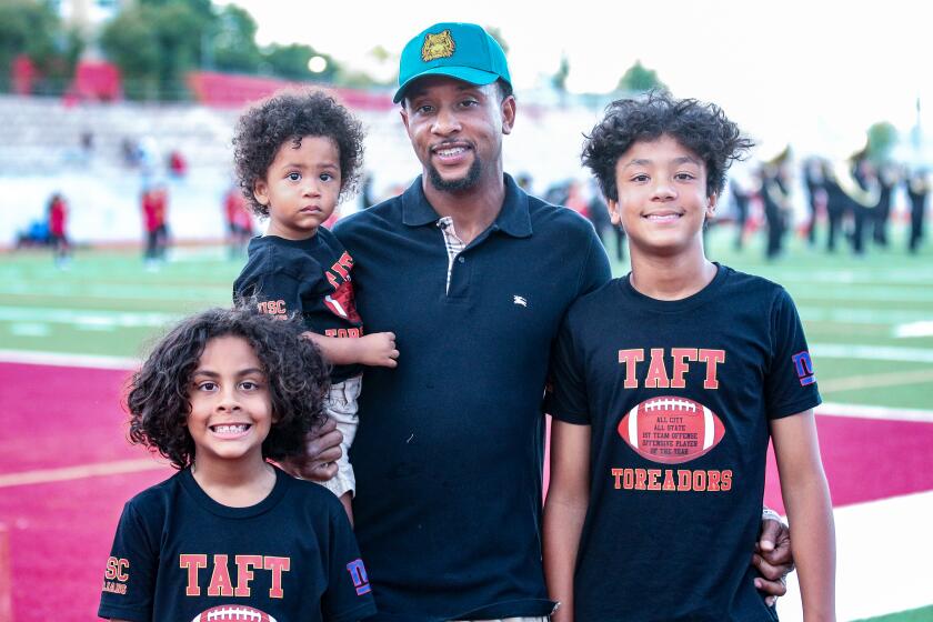 Former Taft standout Steve Smith had his No. 2 jersey number retired and brought his three sons.