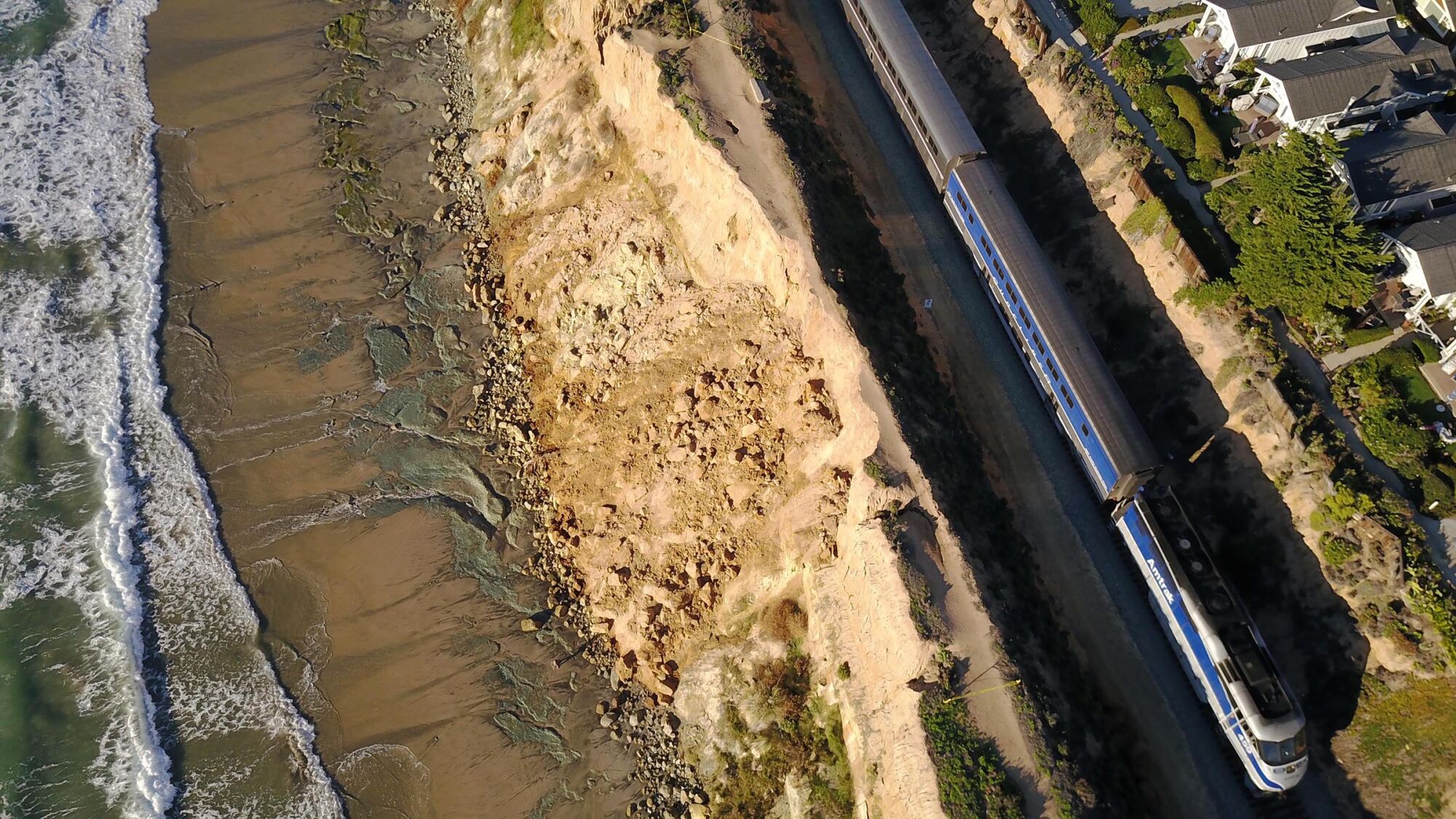 An Amtrak train travels through Del Mar.