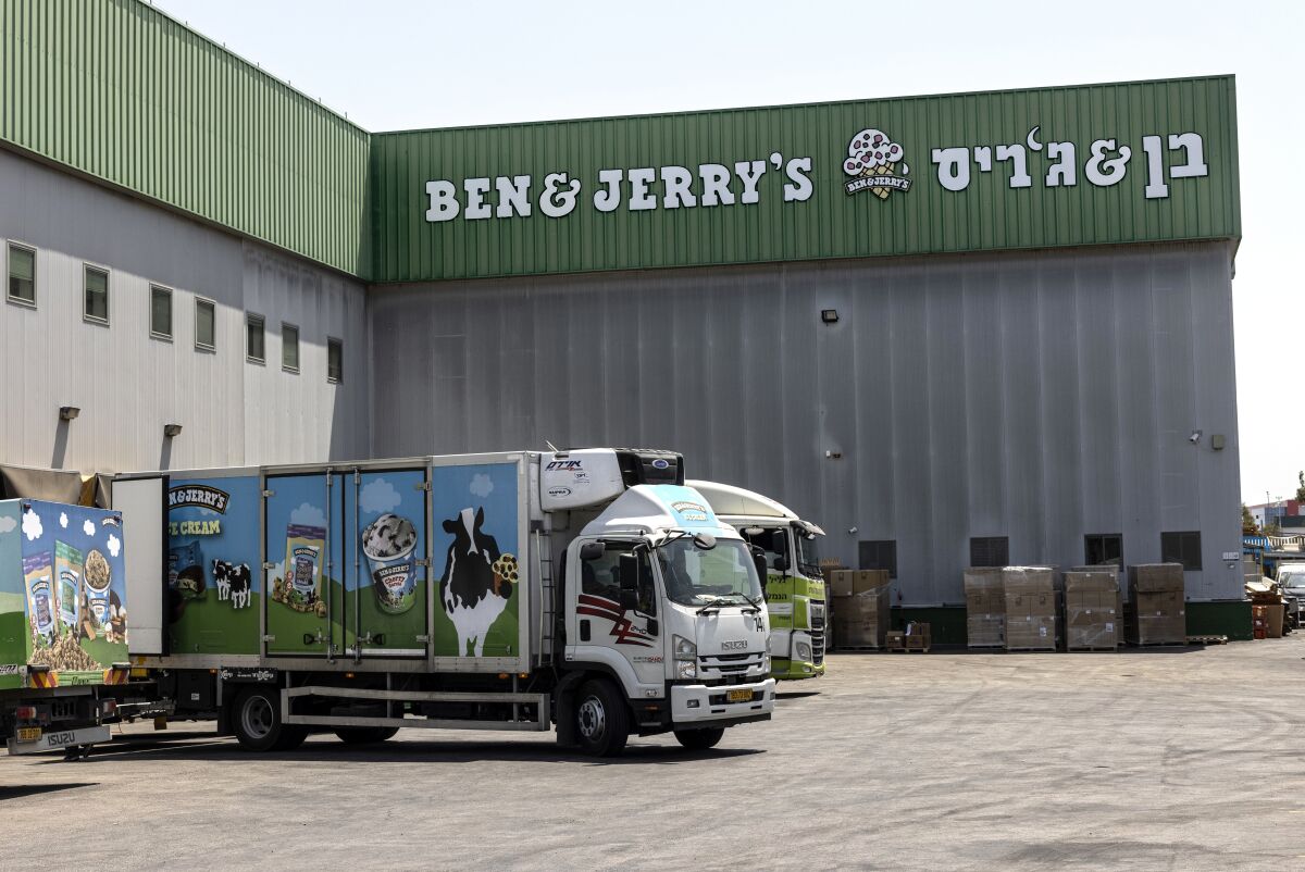 FILE - In this July 20, 2021, file photo, truck sare parked at the Ben & Jerry's ice-cream factory in the Be'er Tuvia Industrial area in Israel. The state of Arizona has sold off $93 million in Unilever bonds and plans to sell the remaining $50 million it has invested in the global consumer products company because its subsidiary Ben & Jerry's decided to stop selling its ice cream in Israeli-occupied territories in the latest in a series of actions by states with anti-Israel boycott laws. (AP Photo/Tsafrir Abayov, File)