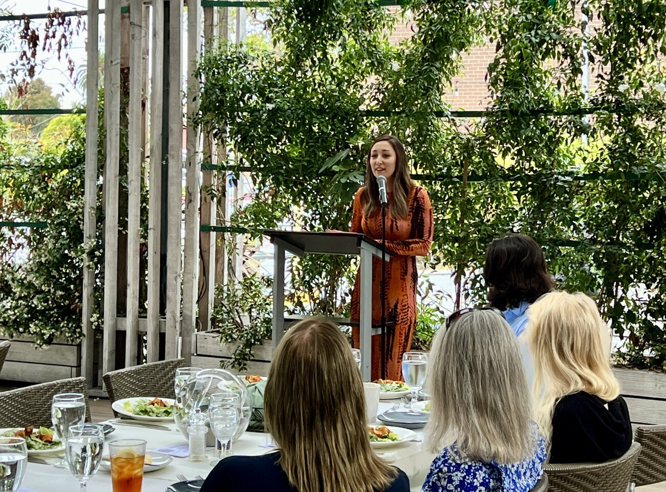 St. Germaine Children's Charity President Katie Christensen speaks at the group's annual luncheon June 7 at The Lot La Jolla.