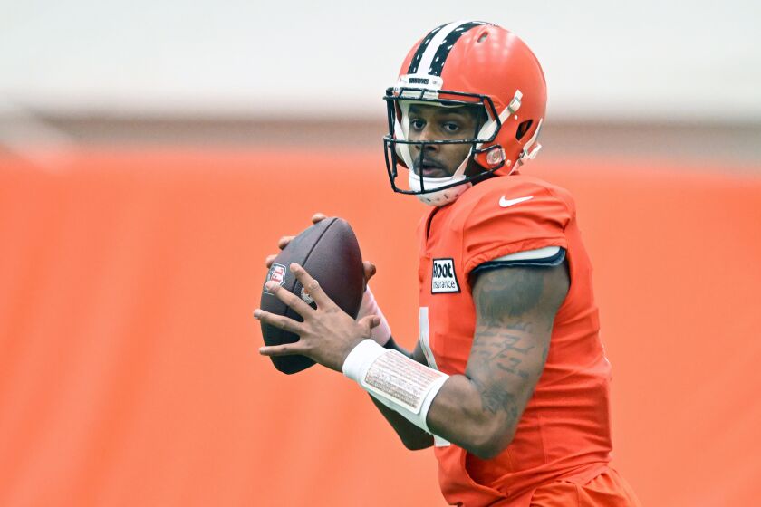 Cleveland Browns quarterback Deshaun Watson looks to pass during an NFL football practice at the team's training facility Wednesday, Nov. 30, 2022, in Berea, Ohio. (AP Photo/David Richard)