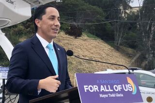 Mayor Todd Gloria at a news conference announcing a pilot program for electric vehicle charging. 