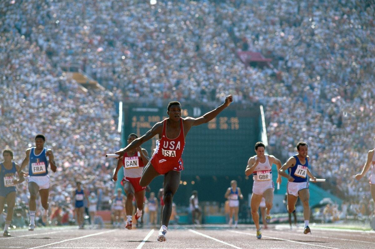 Among the images in photographer Neil Leifer's new book: Carl Lewis setting a world record with his teammates in the 4X100 relay at the 1984 Olympics in Los Angeles. (Neil Leifer)