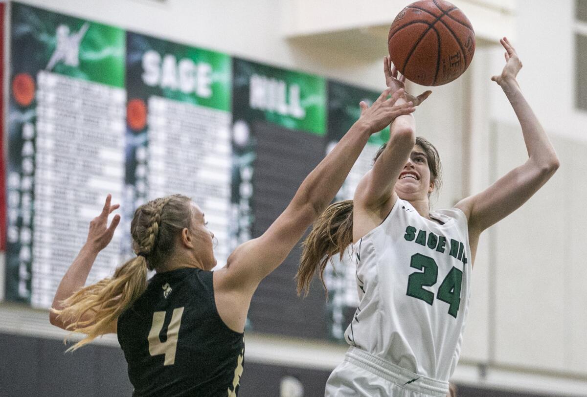 Sage Hill's Isabel Gomez takes a shot against Ontario Christian's Riley De Groot on June 11.