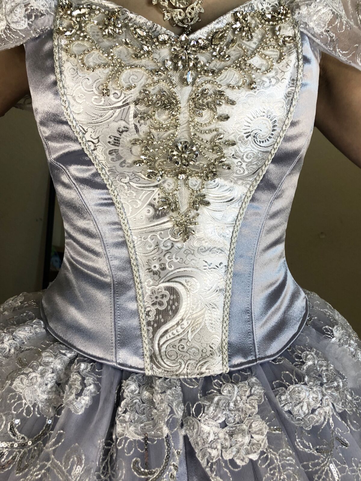 A close-up of the bodice of Cinderella's dress shows the intricate bead work by Mandy Pursley.