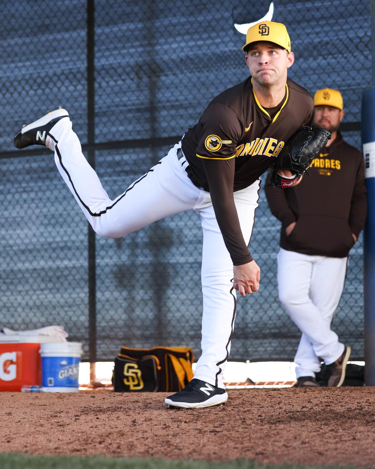 Padres starting pitcher Michael King works in the bullpen at the Peoria Sports Complex.