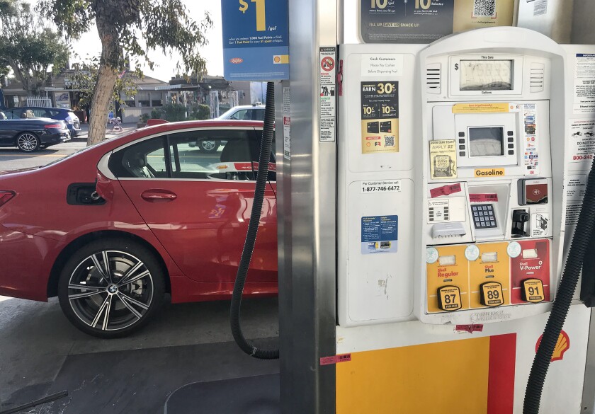A car stops for gas at a Shell station in Laguna Beach in March 2022.