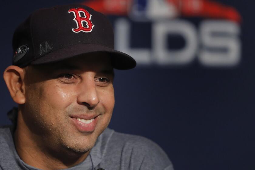 Boston Red Sox manager Alex Cora answers questions during a news conference, Sunday, Oct. 7, 2018, in New York. (AP Photo/Julie Jacobson)