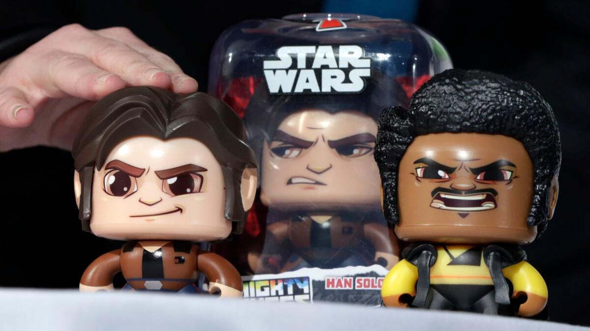 Hasbro — whose products include Star Wars Mighty Muggs, above — posted third-quarter results that fell short of expectations.