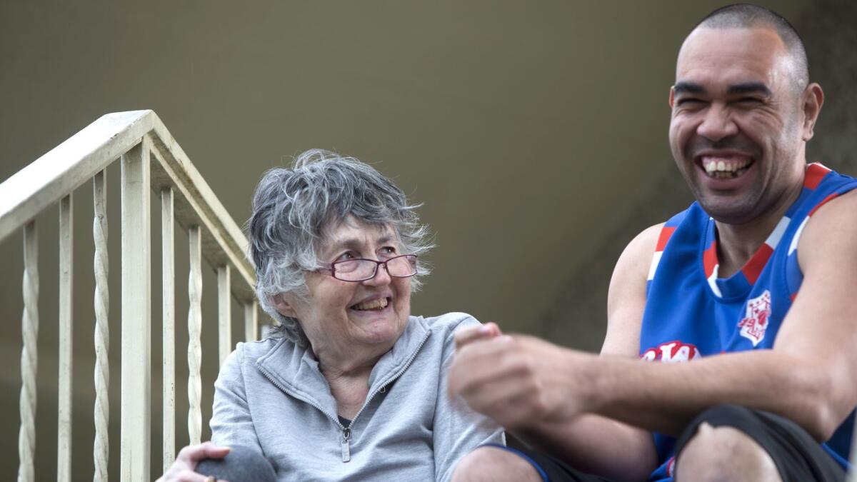 Lamont Thomas with grandmother Sharron Moore.