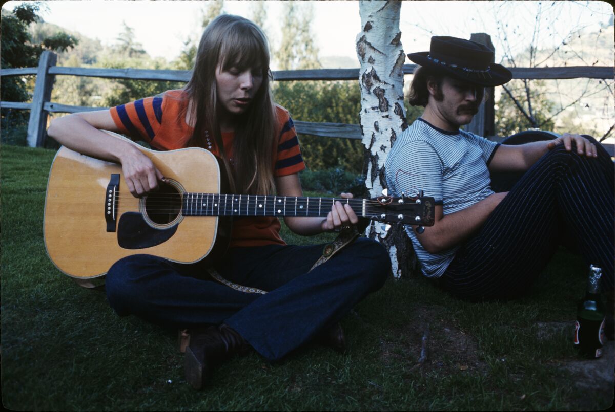Joni Mitchell and David Crosby are shown during a picnic at the Laurel Canyon home of Mama Cass