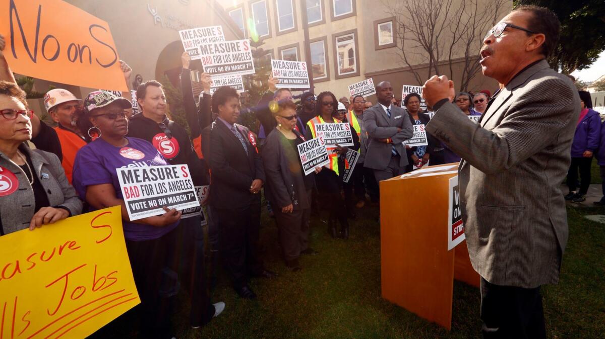 Residents and elected officials at an event urging voters to reject Measure S, which could freeze investment in South L.A.