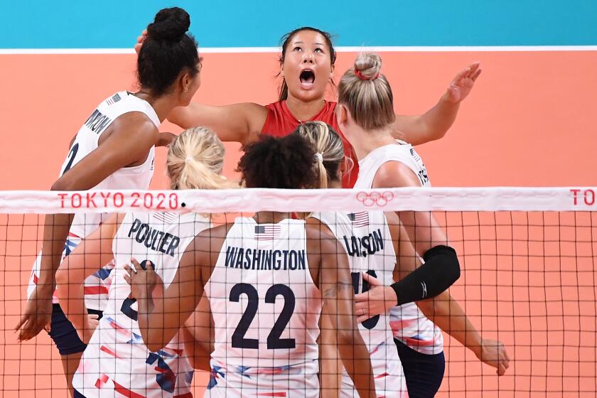 -TOKYO,JAPAN July 26, 2021: USA's Justine Wong-Orantes, red, celebrates a point.