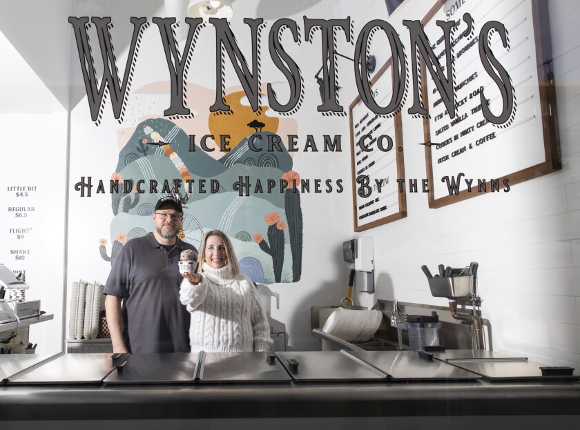 Chris and Sarah Wynn with their chocolate ice cream at Wynston's Ice Cream Co. shop in San Marcos.