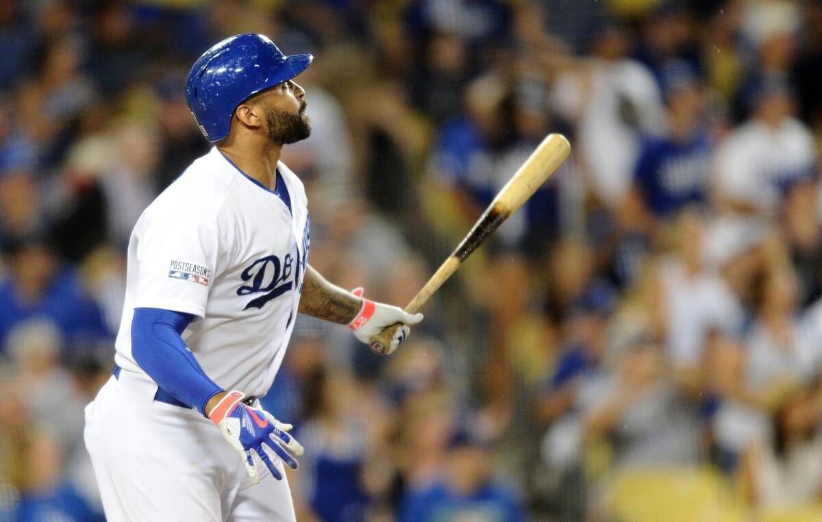 Dodgers right fielder Matt Kemp watches his go-ahead home run in the eighth inning of Game 2 against the Cardinals.