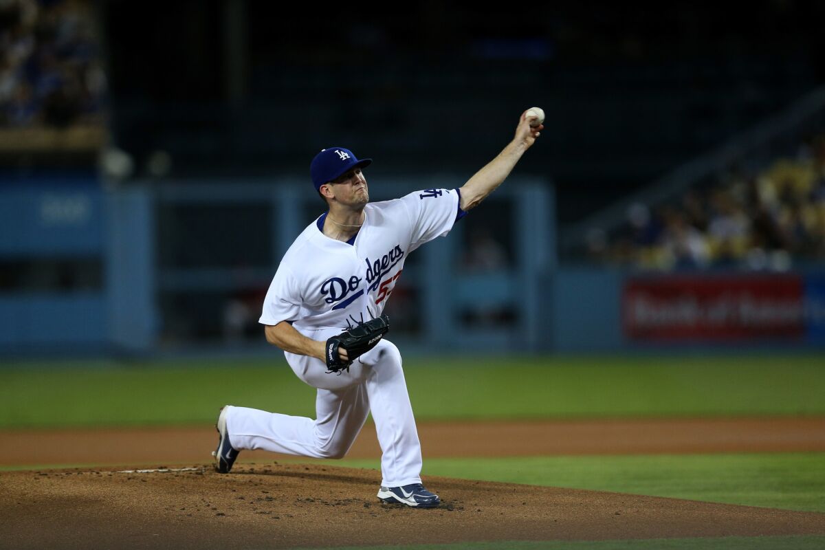 Dodgers starting pitcher Alex Wood took the loss against the Diamondbacks despite giving up just two runs in 6 1/3 innings.