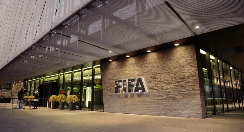 FILE - This Wednesday, Dec. 2, 2015 file photo shows the FIFA Headquarters in Zurich, Switzerland. ﻿The FIFA ethics committee has 13 formal investigations ongoing, plus preliminary enquiries in 62 more cases, the soccer body's lawyers said Tuesday June 23, 2020, during a two-day online review. (Walter Bieri/Keystone via AP, File)