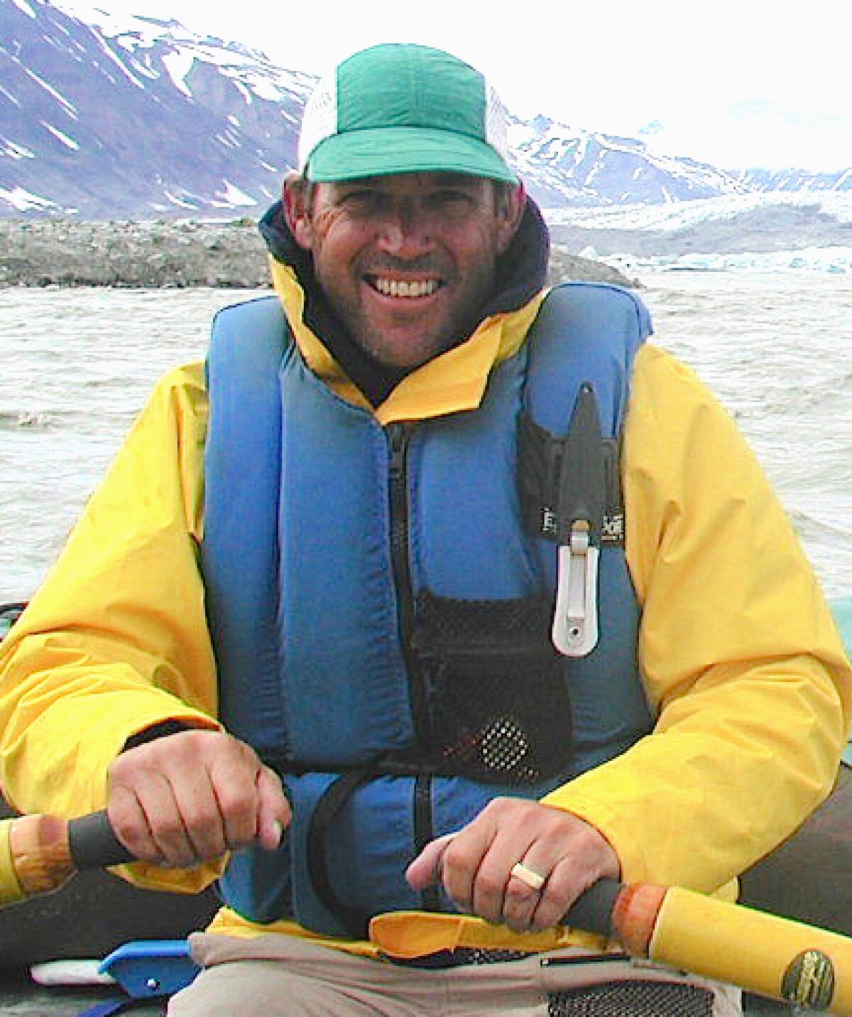 California geologist Jeffrey Mount paddles down the Alsek River
