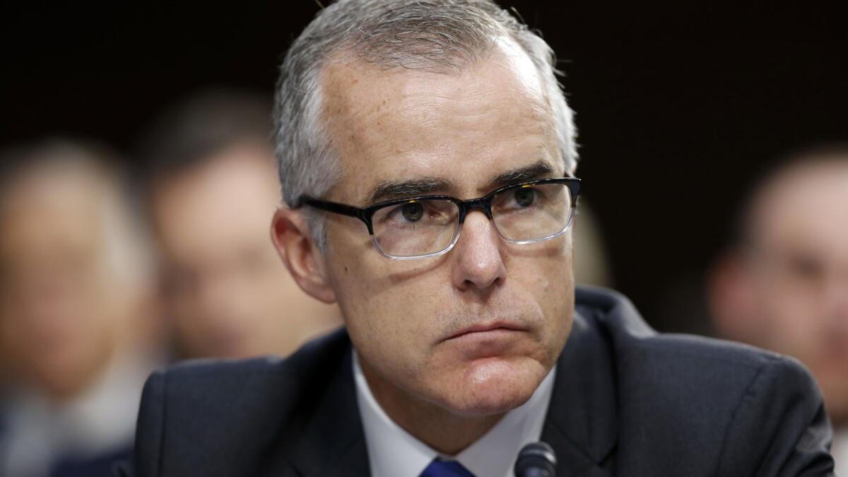 Former FBI Deputy Director Andrew McCabe listens during a Senate Intelligence Committee hearing in June.