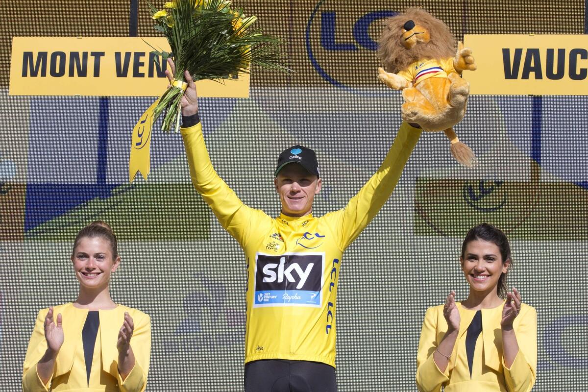 Chris Froome eventually maintained the yellow leader's jersey after a wild finish to Stage 12.