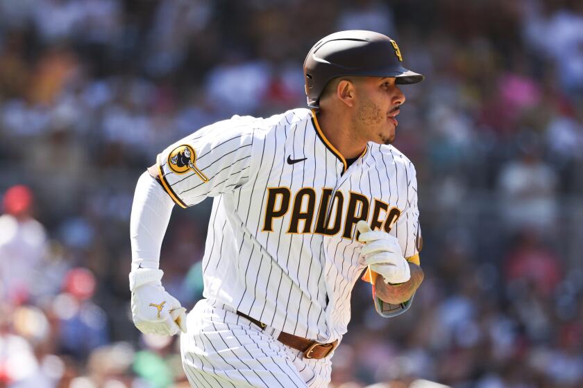 San Diego Padres catcher Webster Rivas returns to home plate in the third  inning of a baseball game against the San Francisco Giants in San  Francisco, Sunday, Oct. 3, 2021. The Giants