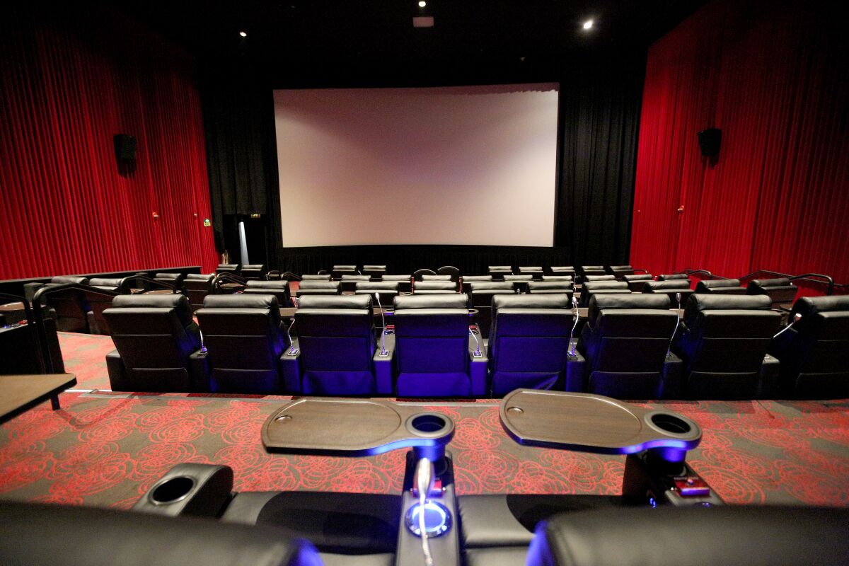 Studio Movie Grill opened the doors of its Glendale location on Oct. 17. Patrons of the national theater chain can order food and drinks to their seat at the touch of a button.