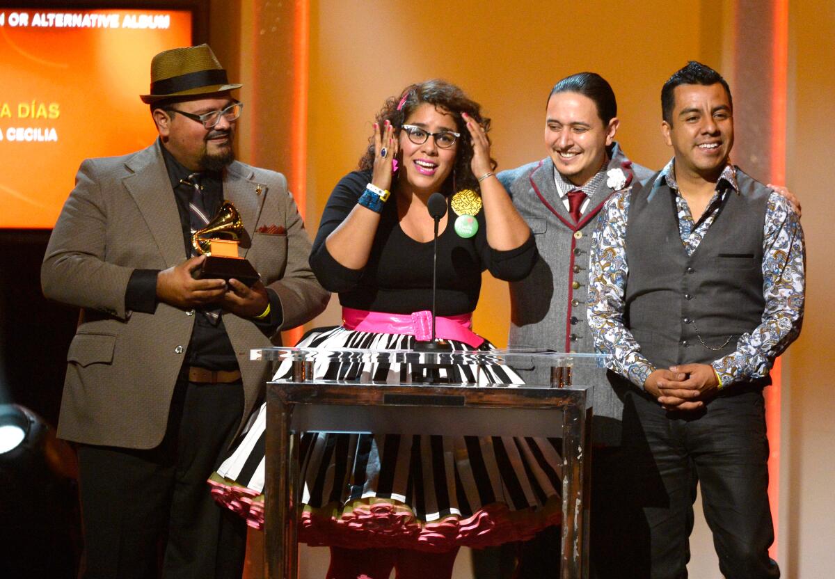 La Santa Cecilia accepts its 2013 Grammy Award