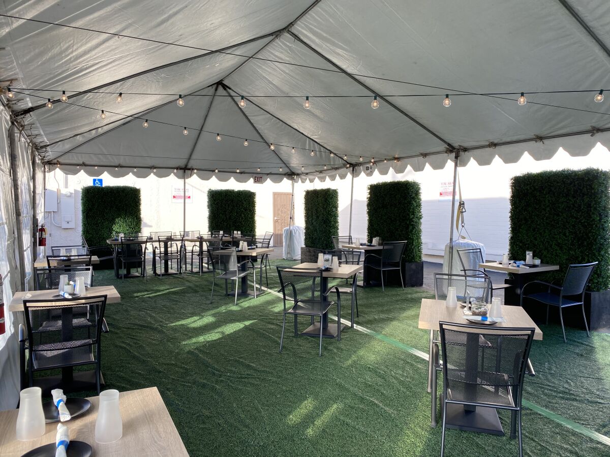 Blade 1936 in Oceanside has built a tented outdoor dining room 