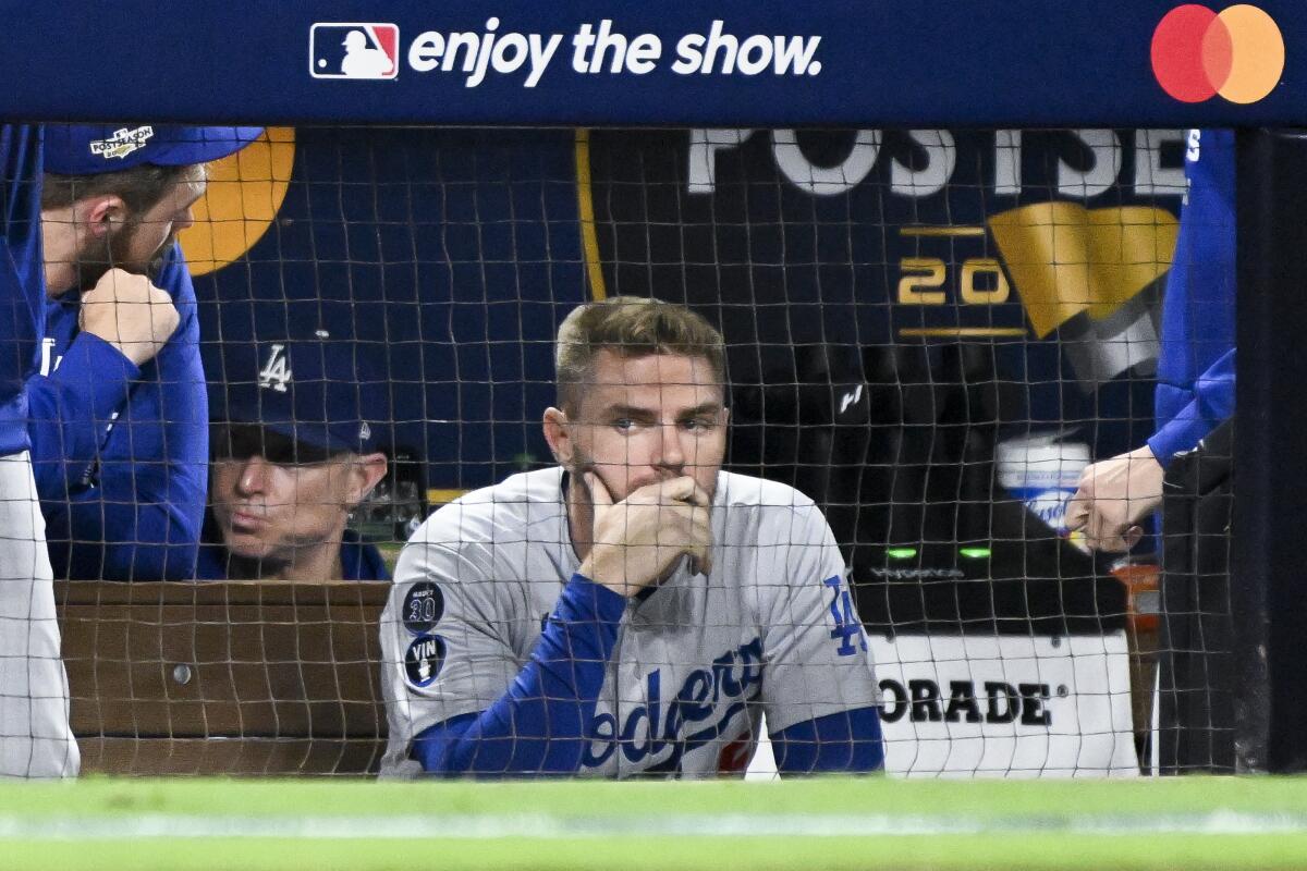 San Diego, CA - October 14: Los Angeles Dodgers' Freddie Freeman watches from the bench.